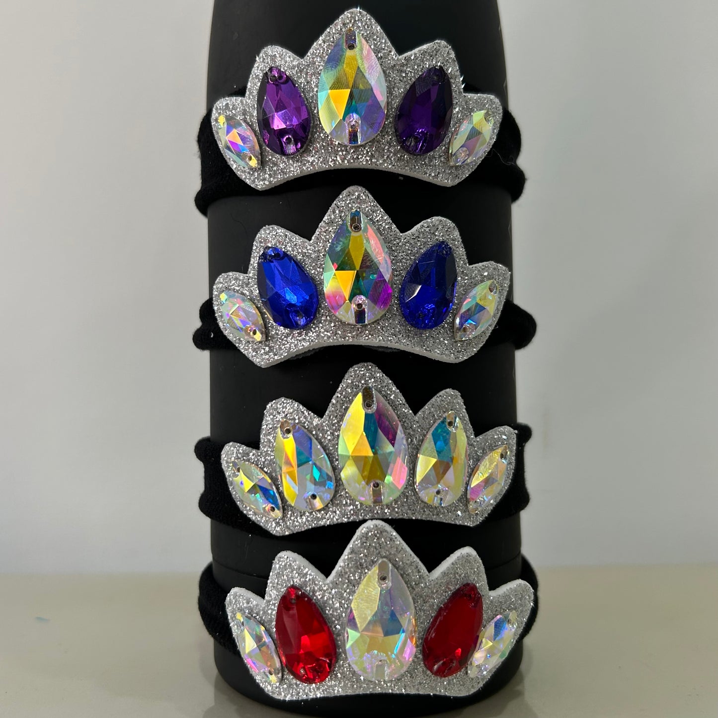 comprar online coleteros brillantes para moño de gimnasia ritmica coletero de pedruscos brillo peinado pelo gimnasta colores rojo azul morado aurora boreal plata
