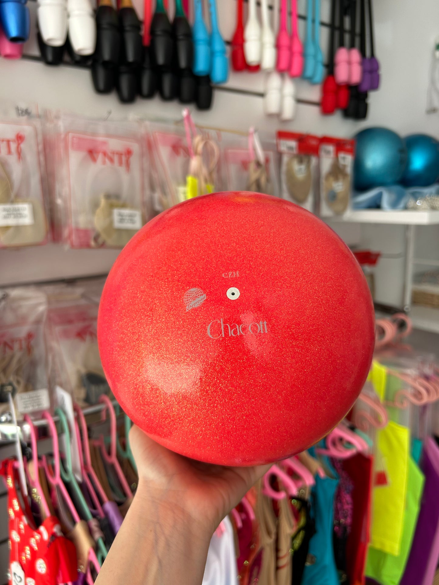 pelota glitter naranja fosforito ritmica, pelota homologada, pelota competición, aparato ritmica, material FIG, gimnasia ritmica competición, pelota profesional, accesorios gimnasia ritmica Shaer tienda rítmica Madrid envíos a España online 